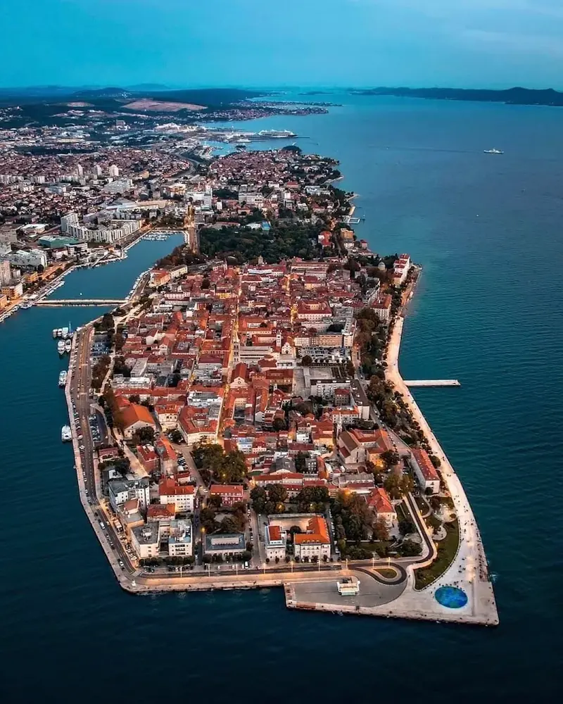 Zadar’s old town on its peninsula, seen from the air at dusk
